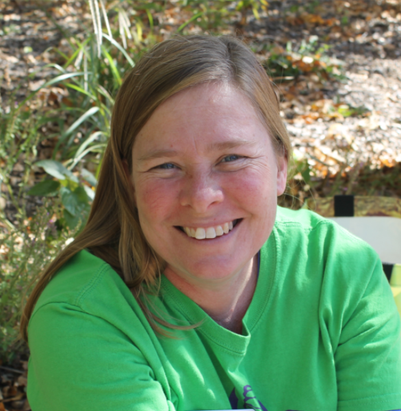 smiling woman with green tshirt at Topeka Zoo